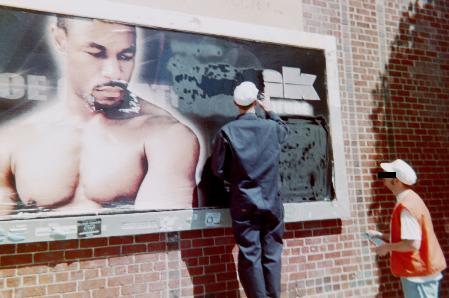 Billboard liberators at work